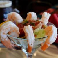 Shrimp Cocktail · 4 jumbo shrimp served with cocktail sauce, horseradish and lemon slice.