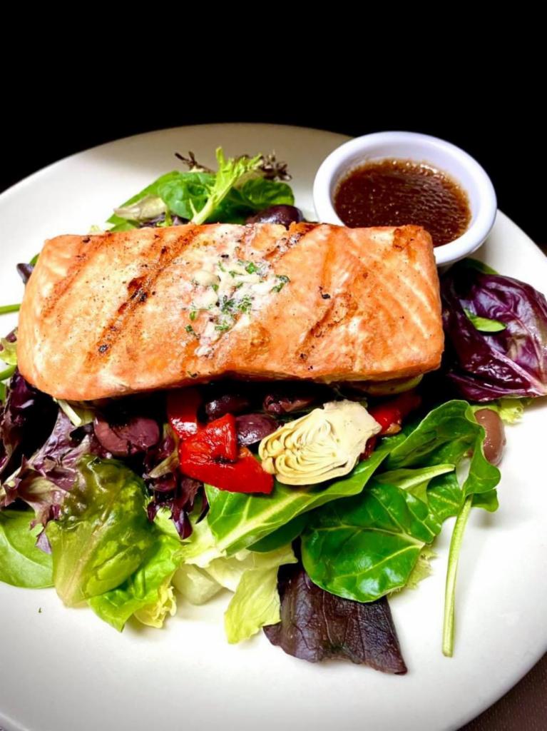 Salmon Roma Salad · Grilled salmon over mixed greens, artichokes, roasted peppers, Kalamata olives and house vinaigrette.