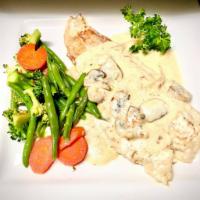 Red Fish Pontchartrain · Oven broiled red fish, lump blue crab, mushrooms and white wine cream sauce.