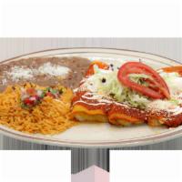2 Piece Fish Enchiladas · 2 red or green enchiladas, with grilled fish. Served with beans, rice, and warm hand-made to...