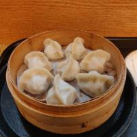 Steamed Pork Dumpling · 8 pieces. Cabbage or egg and chive.