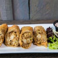 Home Plate Egg Rolls · All the flaxings our home plate rolled up in a crispy egg roll skin and served with a creamy...