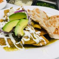 Chilaquiles Con Pollo · With chicken. Traditional tortilla with choice of sauce, onions, queso fresco and sour cream...