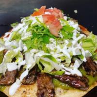 Bistec Huaraches · Beef. Oval corn tortilla stuffed with refried beans and topped with lettuce, cheese and sour...