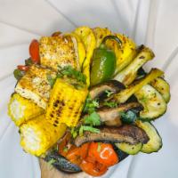 Molcajete Vegeteriano  · Grilled Vegetables , zucchini, squash, corn, portabello mushroom, cactus, tomatoes peppers, ...