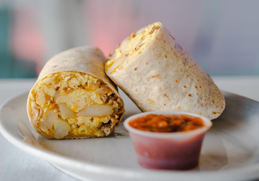 The Breakfast Burrito · 3 scrambled eggs, cheddar cheese, baked potatoes, sausage and bacon with a side of pico de gallo.