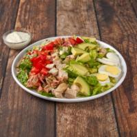 Roasted Chicken Cobb Salad · Roasted Chicken Romaine lettuce, tomato, bacon, Feta cheese, avocado, chopped egg, green oni...