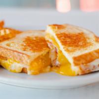 Ultimate Grilled Cheesiness · Pepper Jack cheese, Cheddar cheese, bacon, on your choice of Wheat or Sourdough bread