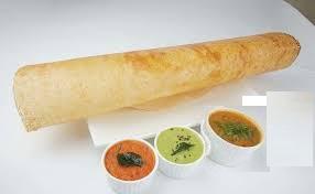 Plain Dosa · A thin crepe made out of fermented rice and lentil batter, served with fresh coconut chutney...