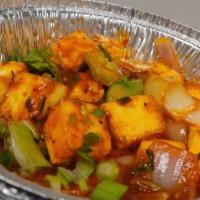 Chili Paneer · Deep fried paneer sauteed with onions, bell peppers and green chilies.