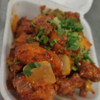 Chilly Chicken · Deep fried chicken sauteed with onions, bell peppers and green chilies.