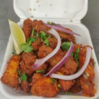 Fish Fry · Tilapia fish cubes coated house made spicy batter and deep fried.