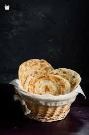 Malabar Parota · 2 multi layered white bread baked on griddle.