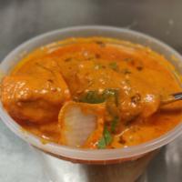 Chicken Tikka Masala Curry · Boneless grilled chicken cooked with tomato, cream, caramelized onions and special spices.