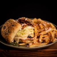 Co-op Burger · The Co-op Burger is a ground brisket and miso roasted mushroom burger with a Camembert and c...