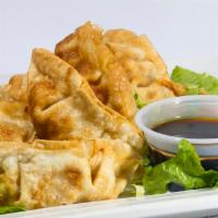 5 Piece Gyoza · Crunchy pork dumplings served with a side of citrus soy dipping sauce.