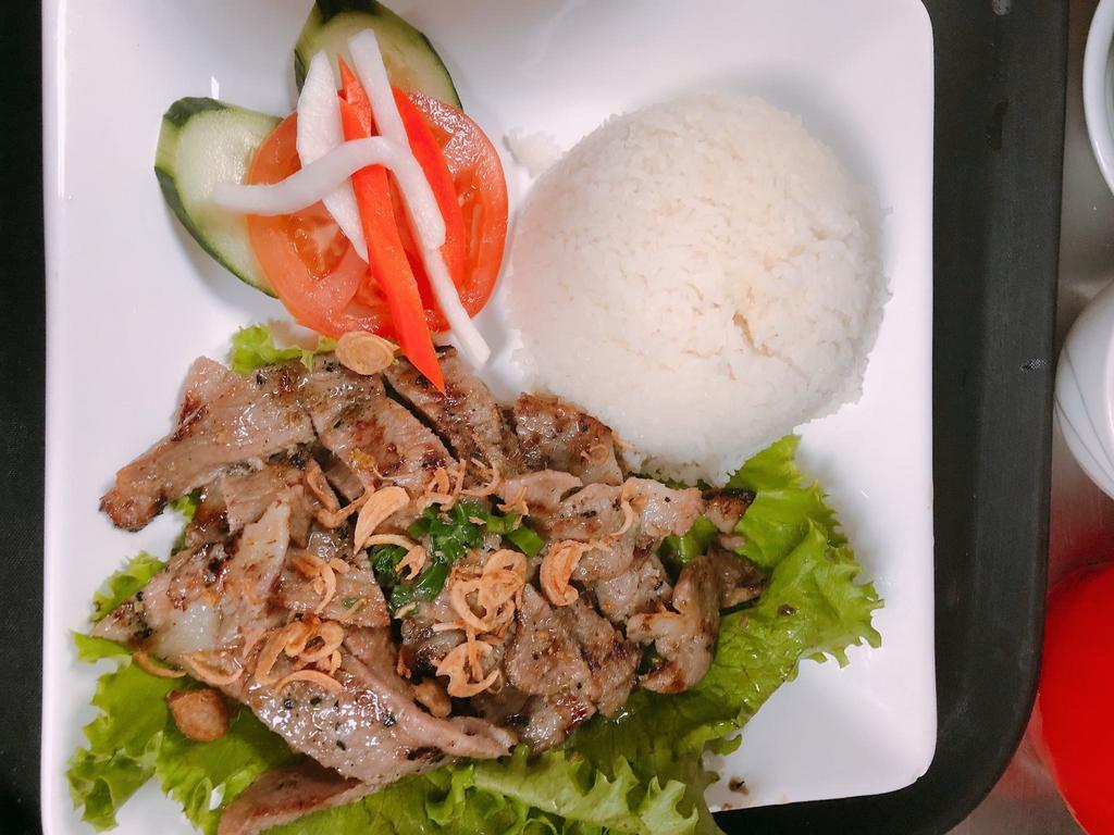 2C. Com Heo Nuong - pork rice · Grilled pork plate.