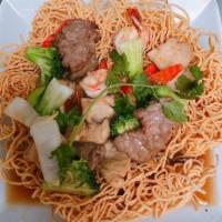 4W. Crispy Egg Noodles · Choice of chicken, beef, shrimp or combination. Stir-fried with mix vegetables in house sauce.