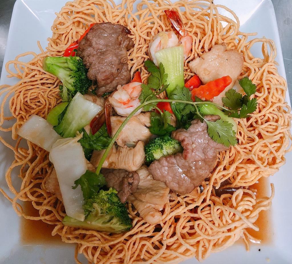 4W. Crispy Egg Noodles · Choice of chicken, beef, shrimp or combination. Stir-fried with mix vegetables in house sauce.