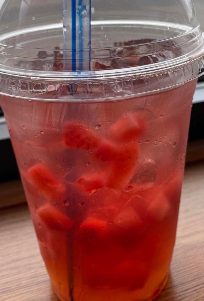 Berry hibiscus with Popping boba and fresh strawberry  · Hibiscus tea served cold with Popping boba and strawberry 