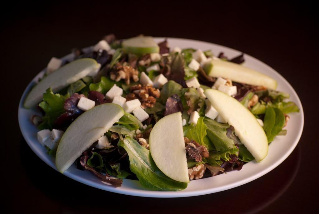 Street Salad · Mixed greens, apple vinaigrette, walnuts and Cotija cheese.