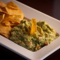 Chips and Guacamole · A fresh salad with an avocado base. 