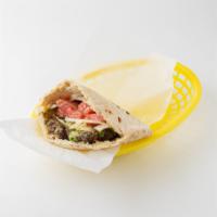 Classic Sandwich  · Falafel and hummus: served in a pita pocket with lettuce, tomatoes, onions and tahineh sauce...
