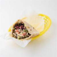 East Village Sandwich  · Falafel, hummus and tabbouleh: served in a pita pocket with lettuce, tomatoes, onions, olive...