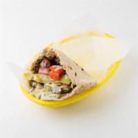 Manhattan Sandwich  · Falafel, hummus, baba ganouj and tabbouleh: served in a pita pocket with lettuce, tomatoes, ...