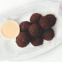 Falafel Side · 4 balls with tahineh sauce on the side.