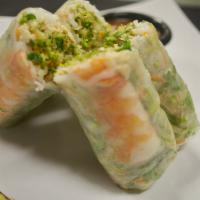 6. Fresh Spring Roll · Soft rice paper wrapped with fresh cilantro, lettuce, mint, shrimp, chicken and rice noodle....