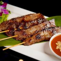 10. Beef Satay · Marinated with our house special soy sauce served with peanut sauce.