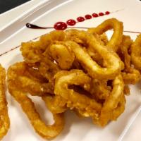 13. Calamari Puffs · Breaded calamari fried to golden crispy. Served with Thai garlic sauce.