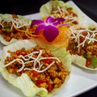 14. Thai Chicken Lettuce Wraps · Bell pepper, onion, fried noodle and ground chicken stir fried with Thai hoisin sauce. Serve...