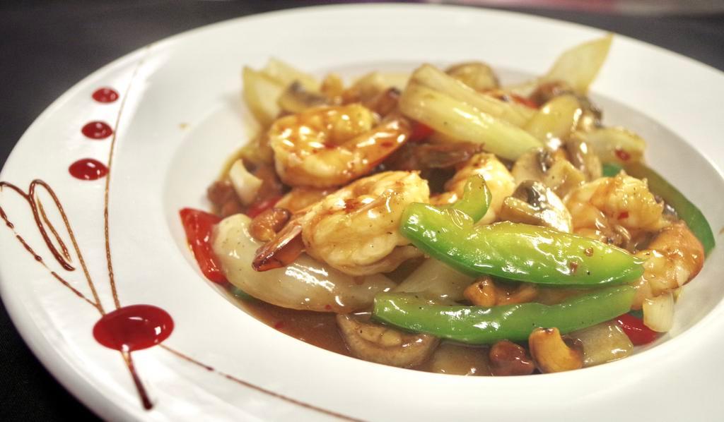 1. Thai Chili Cashew · Fresh Thai chili stir fried with pepper, onion, mushroom, cashew nuts and Thai chili sauce. Served with your choice of meat. Spicy.