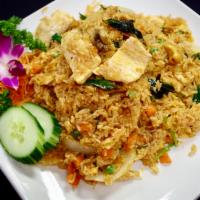 2. Thai Basil Fried Rice · Thai jasmine rice stir fried with egg, peas, carrots, scallions, cashew nuts, onions, fresh ...