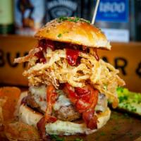 The Cowboy - Best Seller! Burger · Pepper jack cheese, thick-cut applewood bacon, frizzled onions, and BBQ sauce.