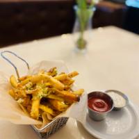 Truffle Parmesan Fries · Seasalt, parsley, and garlic sauce with truffle infused olive oil.