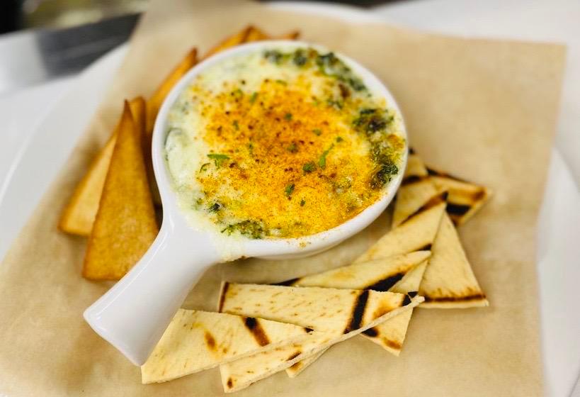 Crab and Spinach Dip · Served with grilled & fried pita bread.