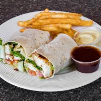 George's Grilled Chicken Wrap · Lettuce and tomatoes. Served with a portion of fries.