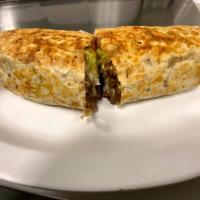 Burrito · Burrito made in a 14 inch flour tortilla. Filled with a smudge of beans, your choice of meat...