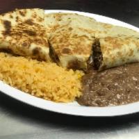 Quesadilla Especial · Flour tortilla filled with cheese and your choice of meat. Served with rice and beans.