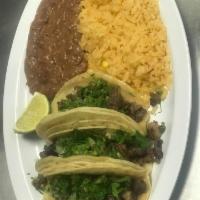 Taco Plate · 3 pieces. Pollo, res, pastor, barbados, chicken, ground beef, pork or barbacoa. Served with ...