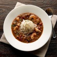 Spicy Seafood Gumbo · Spice up your meal! Starting with a traditional roux, fresh fish, wild Gulf shrimp, real okr...
