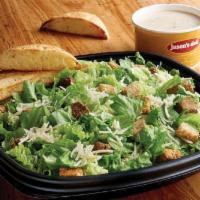 Family Side Caesar Salad · Romaine, Asiago, croutons, served with creamy Caesar dressing. Served with herb focaccia bre...