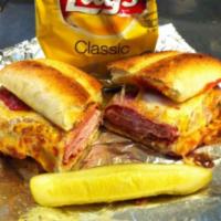 Submarine Gondola Sandwich · A mouth-watering combination of lean ham, spicy salami, tangy pepperoni, mozzarella and ched...
