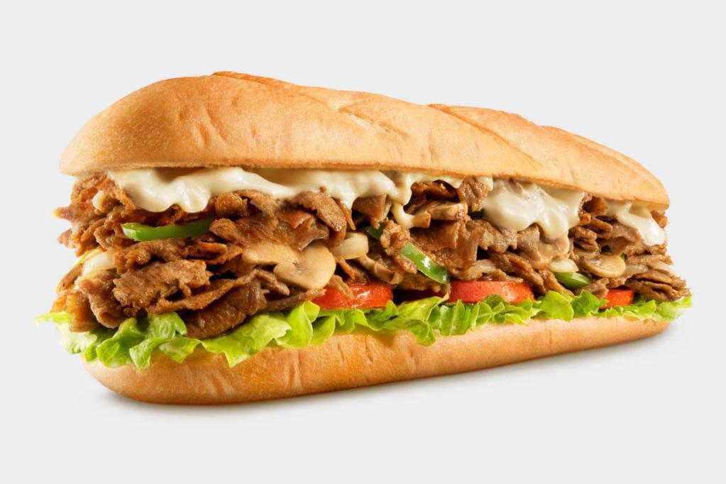 Philly Cheese Steak · Steak, grilled onion, grilled pepper, mushrooms and white sauce.