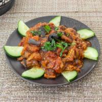 Eggplant in Tomato Sauce · Cubed eggplants sauteed with onions, green peppers in homemade tomato sauce.