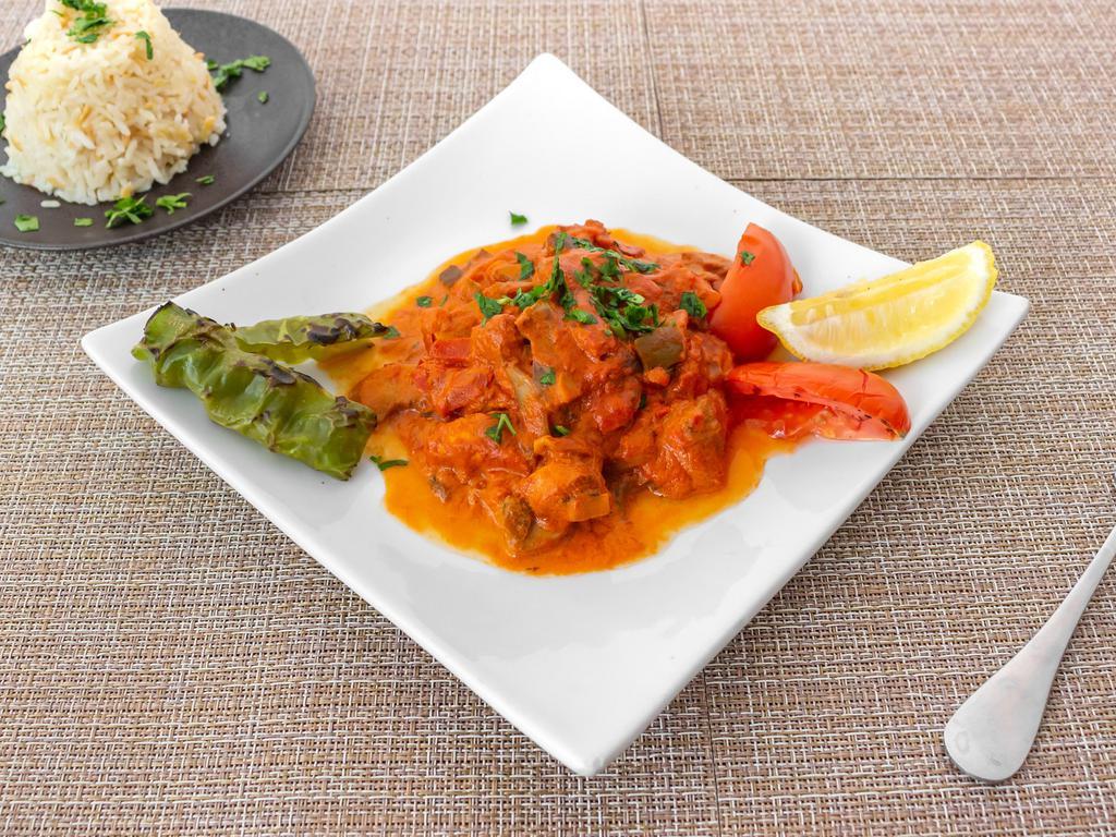 Sautéed Chicken · Cubes of chicken sautéed with mushrooms, onions, tomatoes and green peppers ln a homemade tomato sauce. Served with rice