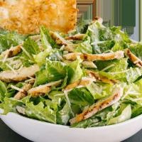 Chicken Caesar Salad · Fresh romaine lettuce, grilled chicken, Parmesan cheese, and Caesar dressing.